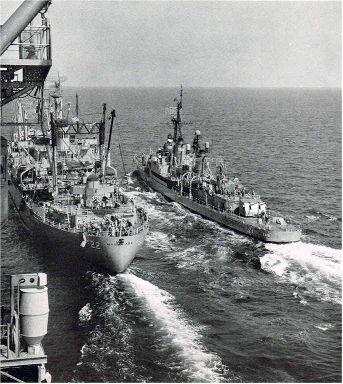  Stern view of USS Knox (DD-742) alongside USS Mauna Kea (AE-22). Picture was taken from USS Ranger (CVA-61) sometime during the Ranger's 1962-'63 WestPac cruise.